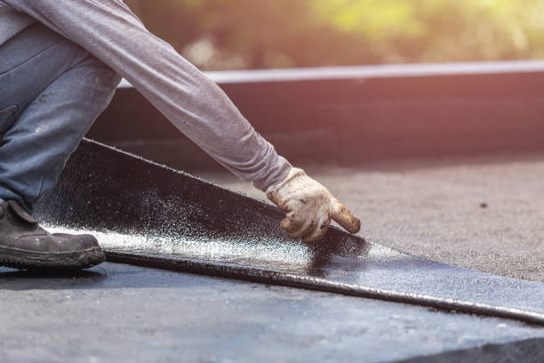 Professional Waterproofing technician working in Lakeland, MI